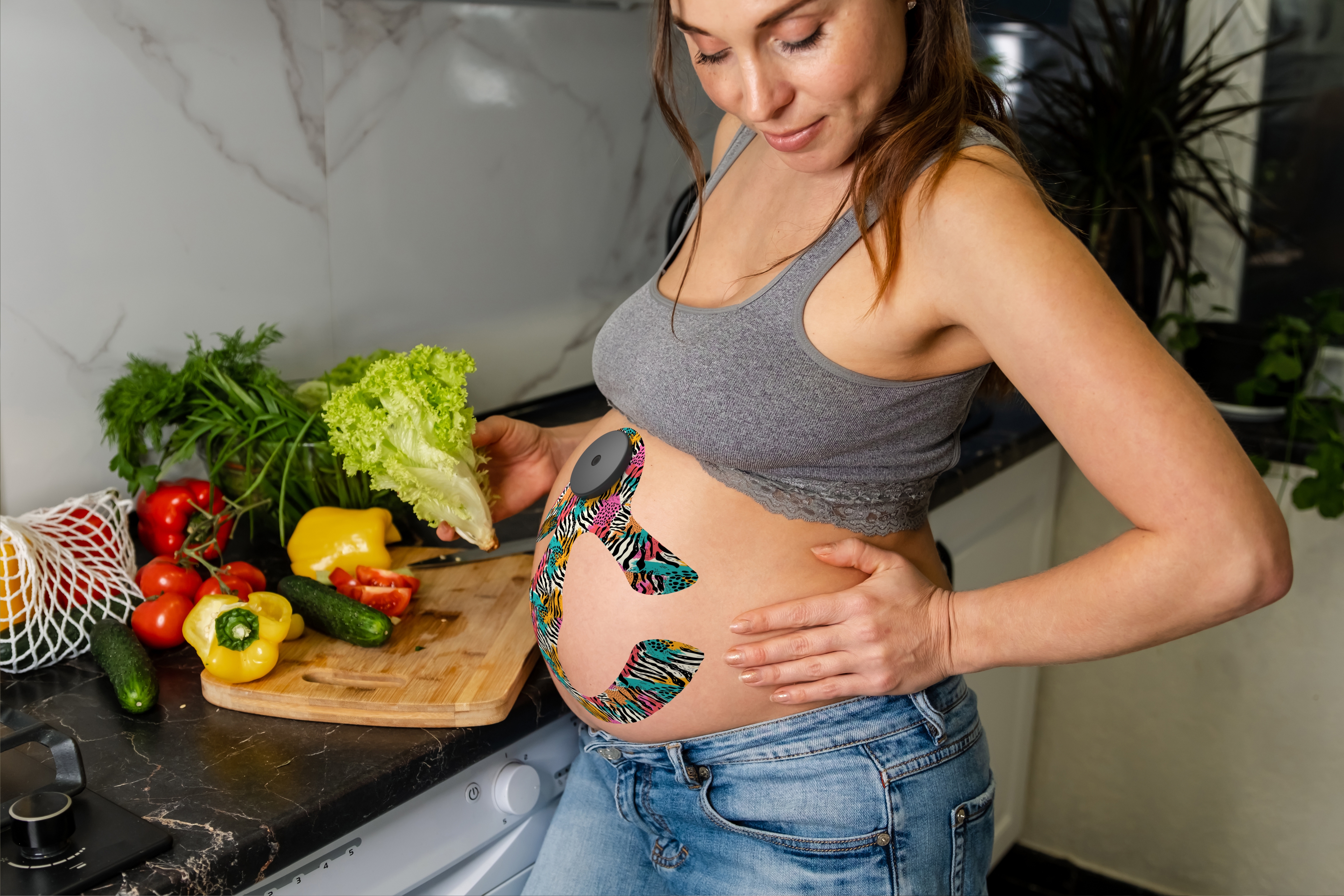 Expectant mother wearing the Embryo patch at home